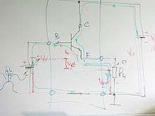 common collector with indicated voltage drops and currents