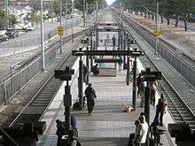 The Blue Line platform of Imperial/Wilmington.  The Green Line platform is above in the median of the I-105.