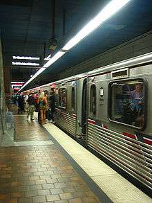 A Red Line train bound for North Hollywood stops at 7th Street/Metro Center for passengers.