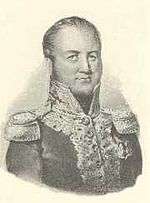 Sepia print shows a man with a high forehead wearing a dark uniform with epaulettes and gold braid on the collar and front of the coat.