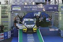 Lukyanuk and Arnautov on Neste Oil Rally Finland podium 2013 -first place in class