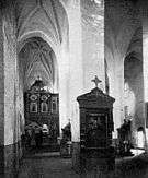 Church interior with high, vaulted ceilings