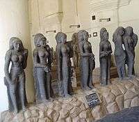 seven stone women sculptures