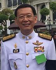 Government officer in military-style suit