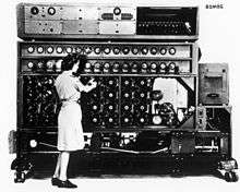 Woman working on a Bombe computing device.
