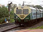 Tan-and-green train