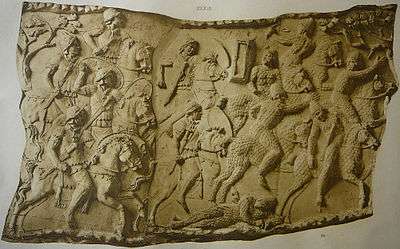 A sculpted scene from Trajan's Column of Roman cavalry fighting Sarmatian cavalry.