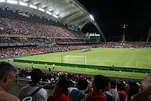 A near-capacity crowd watch Liverpool play South China on the first day of the pre-season tournament.