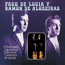 Two men in suits depicted in purplish tint with smaller inset full color photo of same two men standing with their flamenco guitars standing upright on the floor in front of them.