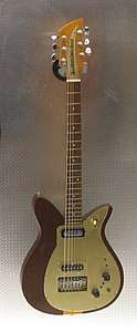 A 1957 Rickenbacker combo 400 with "tulip" style cutaways, and an added bridge pickup.