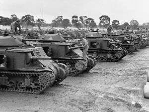 A line up of dozens, if not hundreds of tanks