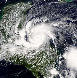 Satellite imagery of a small hurricane north of Honduras