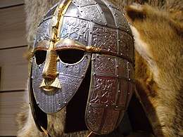 Colour photograph of a modern replica of the Sutton Hoo helmet.