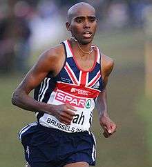 A man representing Great Britain focuses on running.