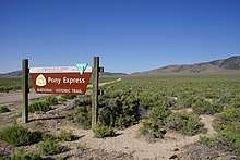 Pony Express road sign in a desert setting with sage brush