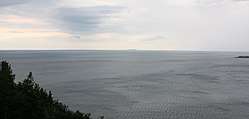 A view of the Cabot Strait from White Point, Cape Breton Island. St. Paul Island is visible in the distance.