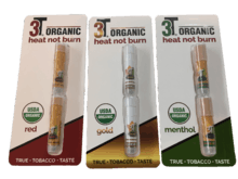 3T Organic red, gold and menthol bubble-packs containing stick-like products.