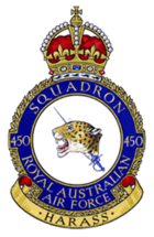 Royal Australian Air Force crest depicting a jaguar's head couped, pierced by a rapier in hand; the jaguar's head symbolises 'death and destruction wrought by the enemy'; the rapier symbolises 'offensive action taken by the squadron'; the motto beneath reads "Harass" based on the squadron's nickname 'The Desert Harassers'