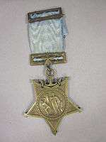 Star-shaped medal on a blue ribbon