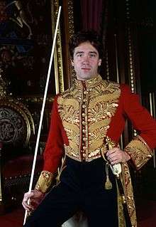 The 7th Marquess of Cholmondeley wearing the court uniform of the Lord Great Chamberlain (1992)