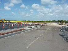 Photo showing the Brickwall lane junction of the new road whilst being constructed, several months prior to opening