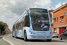 Light-blue articulated bus