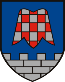 Coat of arms of Großsteinbach in Austria, depicting a stylised flower of Fritillaria meleagris