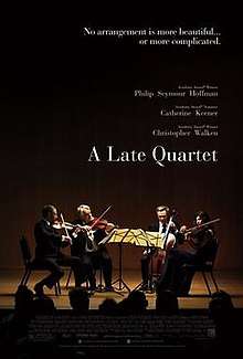 Poster for the film, featuring four musicians on a stage; the title: "A Late Quartet"; and a byline, "No arrangement is more beautiful… or more complicated."