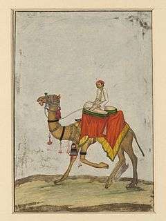  A painting of a man sitting on a camel and playing the drums