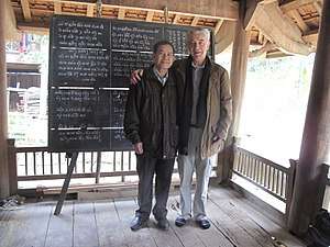 A picture of Michel Ferlus with Vi Khăm Mun, a scholar of Tương Dương, Nghệ An, Vietnam, at Mr. Mun's home