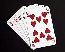 Five playing cards&nbsp;– the ace, king, queen, jack and ten of hearts&nbsp;– spread out in a fan.
