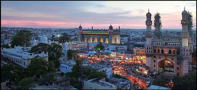 Panorama showing the Charminar, Mecca Masjid, Nizamia Hospital and surrounding bazaars.