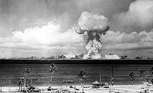 The airburst nuclear explosion of July 1, 1946. Photo taken from a tower on Bikini Island, 3.5 miles (5.6&nbsp;km) away.