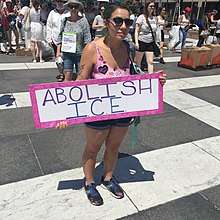 Woman demanding the abolishment of ICE