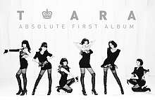 A black and white landscape photo; the six members are styled in a retro fashion wearing leather high heel boots and short, tight-fitting dresses. The group poses strategically as "T-ara" appears above, with a crown graphic acting as a hyphen, and "Absolute First Album" below; both in all caps and a san-serif typeface.