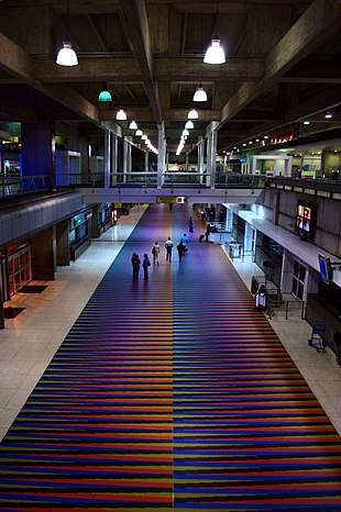 Airport terminal, with colorful floor tiles