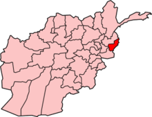 Pink map of Afghanistan, with Kunar Province in red in the northeast