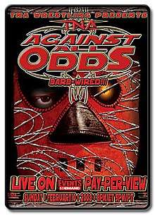 A poster featuring a man in a red mask, with the mask covered in barbed wire with a red logo saying "Against All Odds" and "BARBED-WIRED!!!" directly below at the top of the poster.