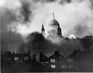Black and white image of St Paul's Cathedral while London burns