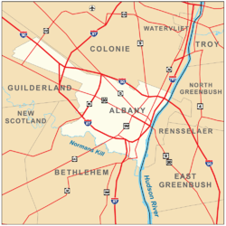 Map shows Albany on the west bank of the Hudson, surrounded by the towns of Colonie, Guilderland, and Bethlehem. Roads are also shown. Interstates 90, 87, and 787 pass through the city boundaries.
