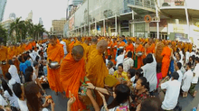 Alms giving to several thousand monks in Bangkok, in an organized event