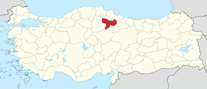 Amasya highlighted in red on a beige political map of Turkeym