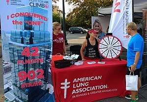 An American Lung Association booth at a local 5k race in Kansas City.