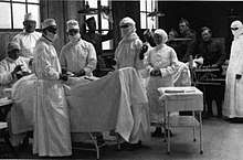 Black and white photo of a surgery team