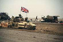 An armoured personnel carrier flying the Union Jack