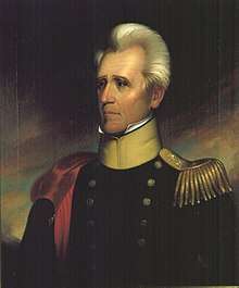 White-haired man in blue army uniform with epaulettes