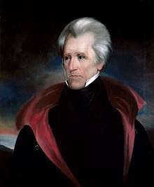 White-haired man with black coat