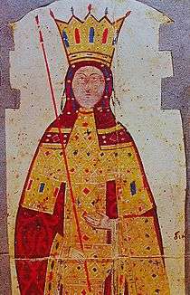 Upper torso of a woman in a full-length scarlet and gold robe, wearing a large golden crown and holding a long thin red scepter.