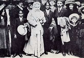 Group photo includes Annie Besant, Jiddu Krishnamurti, George Arundale, and Jiddu Nityananda, London May 1911