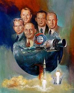 Painting of crew, spacecraft, and launch rockets